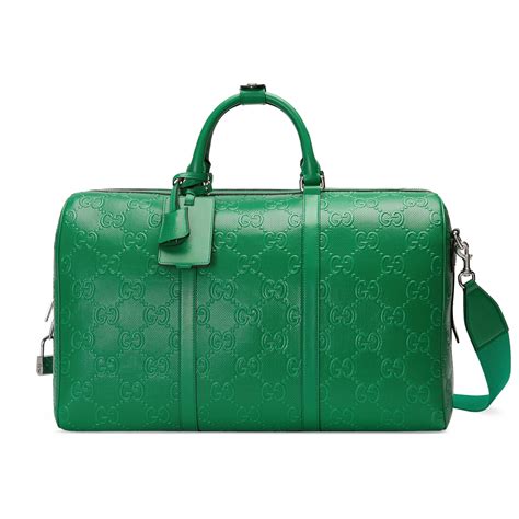 mens gucci luggage bags|Gucci duffle bag with wheels.